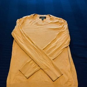 Caramel crew neck sweater.